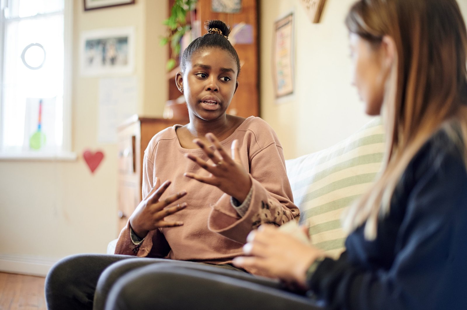 Person speaking with a mental health professional